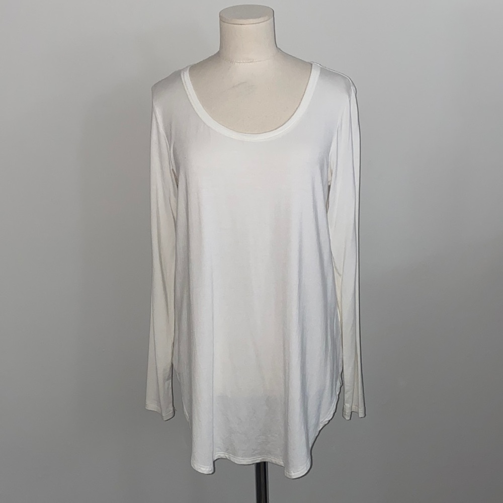 Ivory tunic.
